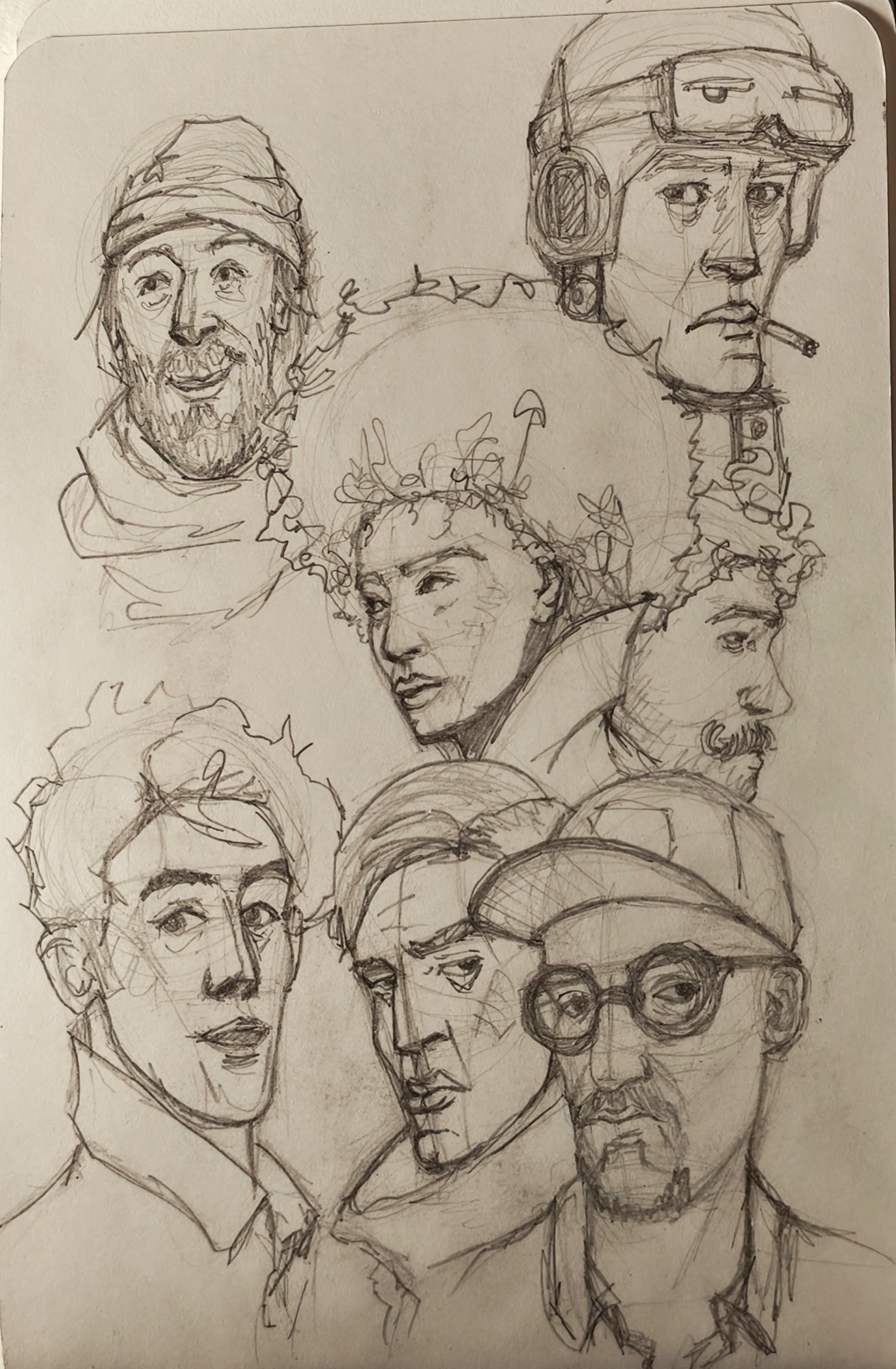 Sketchbook page of seven quick pencil heads: a bearded man in a cap, a pilot in goggles with a cigarette, a man with curly hair, and others in three-quarter and profile views, construction lines left in
